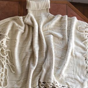 Knit fringe poncho